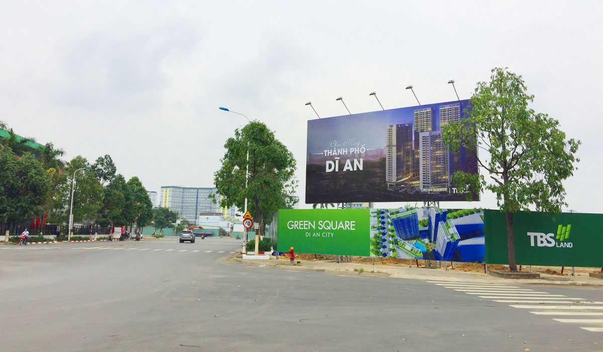 TBS GROUP truc chinh quoc lo 1k truoc du an can ho green tower - TBS GROUP
